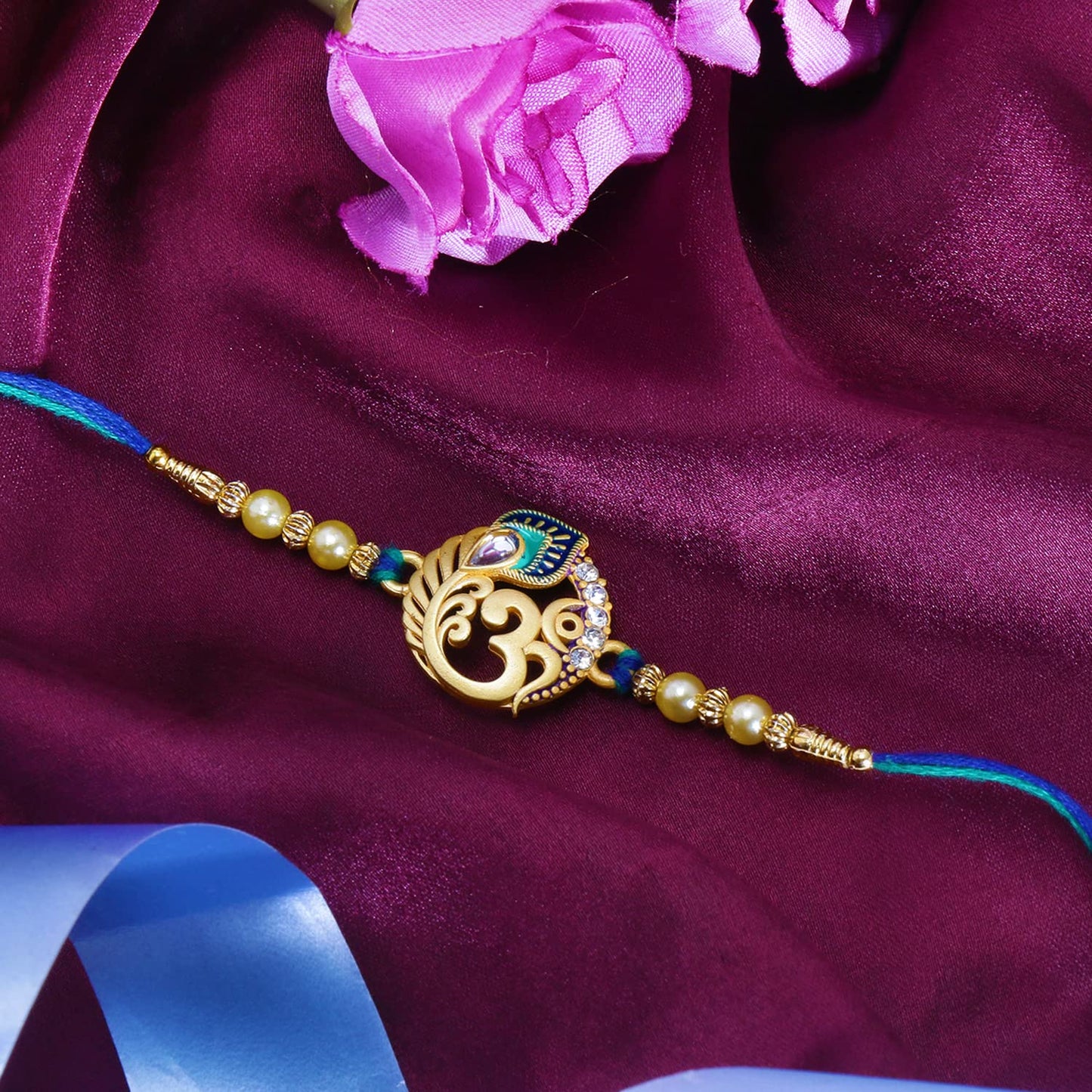 Riddhika Ventures Religious Meenakari Om and Peacock Feather Rakhi With Roli Chawal And Greeting Card
